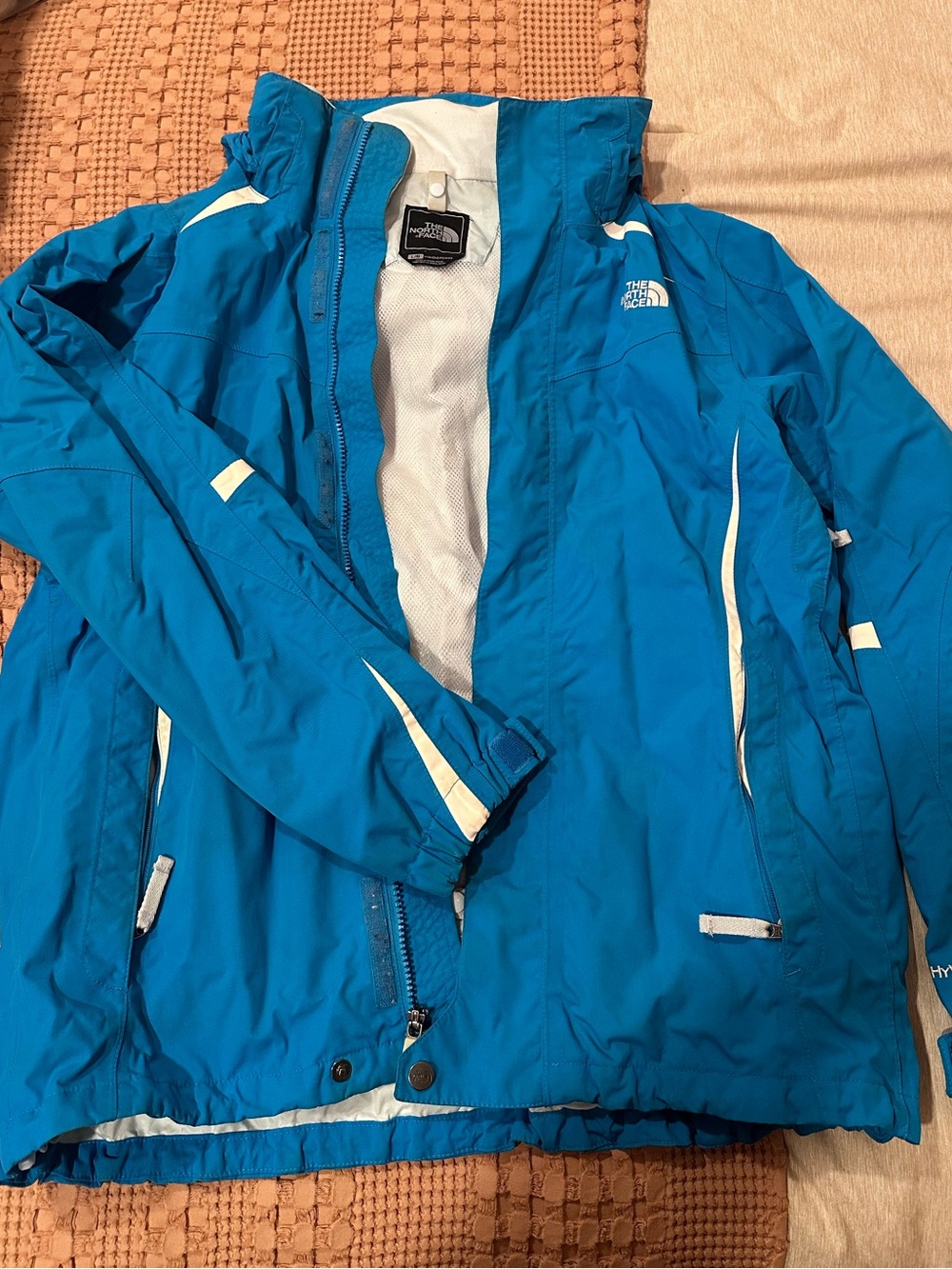 The North Face Turquoise Blue Shell Jacket with White Interior